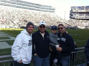 Kevin Williams (C) with son Brandon (L) and his brother Brian (holding Trevor) at Penn State Kevin Williams (C) with son Brandon (L) and his brother Brian (holding Trevor) at Penn State