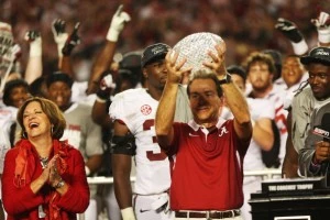 Head coach Nick Saban of the Alabama Crimson Tide celebrates with the BCS Coaches' Trophy as his wife Terry looks on after defeating the Notre Dame Fighting Irish in the 2013 Discover BCS National Championship game Head coach Nick Saban of the Alabama Crimson Tide celebrates with the BCS Coaches' Trophy as his wife Terry looks on after defeating the Notre Dame Fighting Irish in the 2013 Discover BCS National Championship game