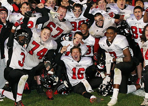 Jackson Memorial football team celebrates winning the Class A South title Jackson Memorial football team celebrates winning the Class A South title