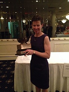 Maureen McCann with the Joe Callano Award for her contributions to officiating as a member of Shore District Board Maureen McCann with the Joe Callano Award for her contributions to officiating as a member of Shore District Board