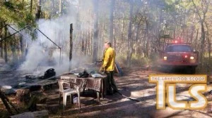 Firefighters respond to a fire in Lakewood's Tent City Firefighters respond to a fire in Lakewood's Tent City