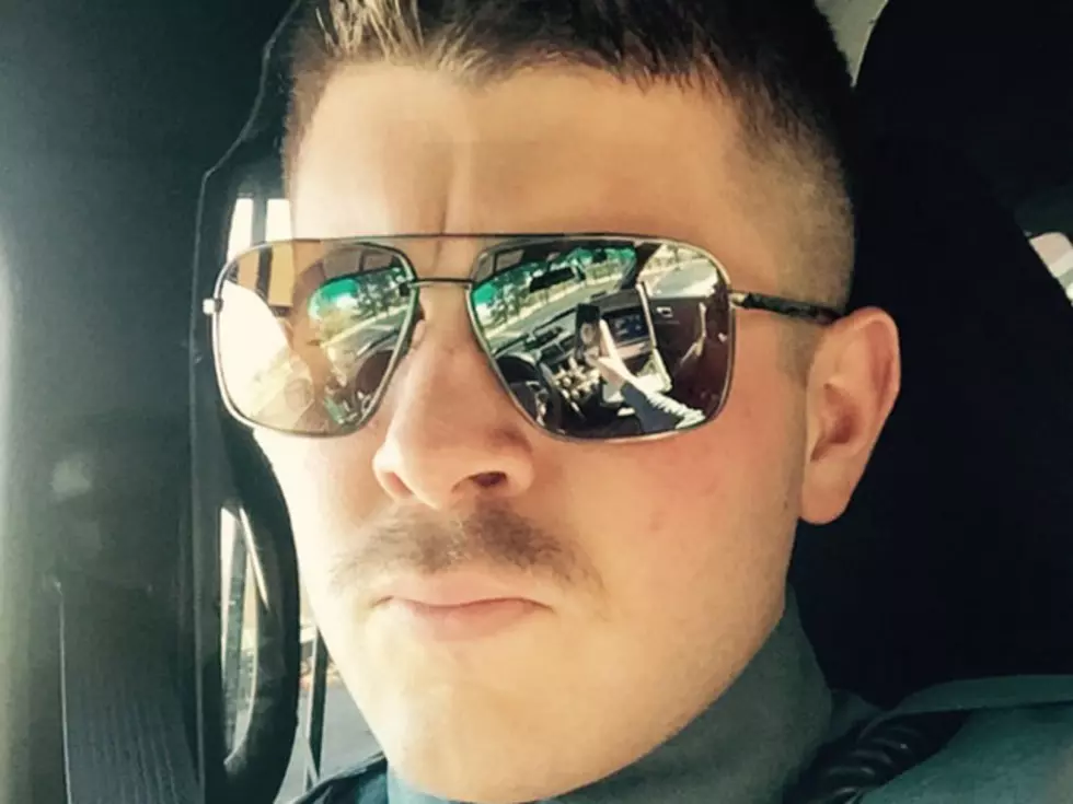 Patrolman Nicholas Saltzman, with hair and care